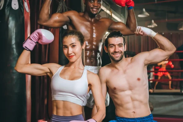 asian-woman-training-kick-boxing-with-punching-glo-2026-01-09-07-49-26-utc